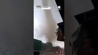 Rare Large Tornado Rips Trees out of Ground Destroys Buildings in Indonesia [upl. by Atnima]