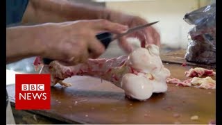 Venezuela crisis Where families buy rotten meat to eat  BBC News [upl. by Hteik]