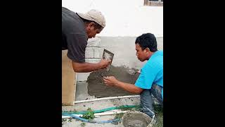 Teaching a labourer the way to plaster civilengineering construction block wall [upl. by Gibbon129]