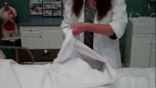 CNA Essential Skills  Making Occupied Bed 834 [upl. by Dorcy860]