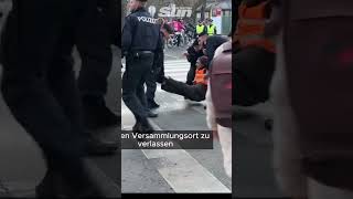 Sprinting police so quick to lift ecoprotesters from the road [upl. by Hsatan923]