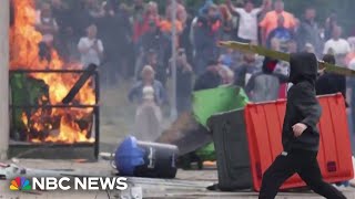 Farright antiimmigrant riots break out across the UK [upl. by Asseneg]