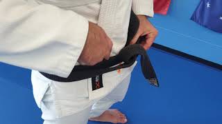 How to Tie a Basic BJJ Belt Knot [upl. by Ainival833]