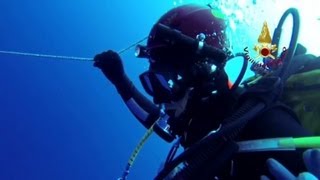 Divers recover bodies off Lampedusa Island [upl. by Inhsor757]