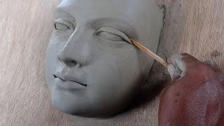 Sculpting a female face in clay Demo how to sculpt a face [upl. by Dyraj]