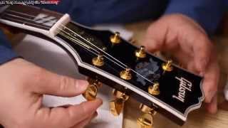 A Guitar Builder Looks at a Chinese made FAKE Gibson Supreme Chibson Guitar [upl. by Liuka]