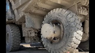 Putting a wheel back on HD605 komatsu haul truck [upl. by Austreng]