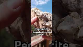 Pegmatite with Lithium pink Beryllium green dots Mica shiny shards Quartz Sandia Foothill NM [upl. by Perron]