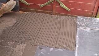 Laying slate on a solid concrete base using adhesive [upl. by Francisco]