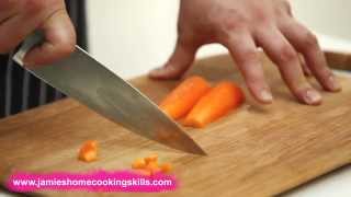 Chopping a carrot  Jamie Olivers Home Cooking Skills [upl. by Marler]