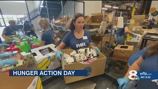 Volunteers take action at Feeding Tampa Bay for Hunger Action Day [upl. by Aihseuqram]