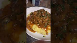 Smothered patties over some mashed potatoes 🥔 🔥🔥🔥 smothered dinnerrecipe dinnerideas [upl. by Tranquada806]