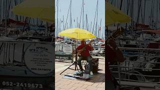 A musician plays a popular tune at the Herzliya Marina israel israelwalking [upl. by Mastic]