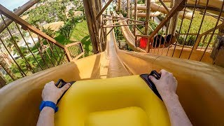 Caribe Bay Water Park  Barracudas  Crazy Inflatable Mat Waterslides Onride POV Aqualandia [upl. by Conners]