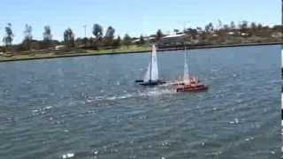 Two Mini40 radio control trimarans hydrofoiling at Austin Lakes Mandurah West Australia [upl. by Linsk]