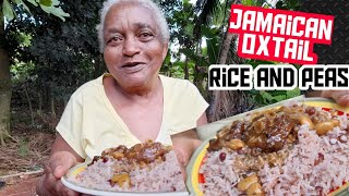 80 years old Mama ENA cooks Oxtail with Rice and Peas outdoor cooking [upl. by Hajin]