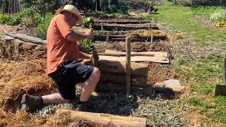 TRANSFORMING a Slope into Small Terraced Vegetable Garden Beds [upl. by Aynnat380]