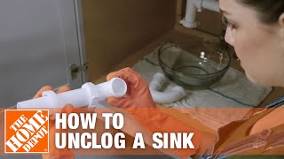 How to Unclog a Kitchen Sink  The Home Depot [upl. by Azeret]