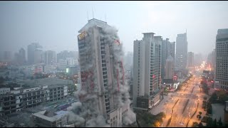 118MeterHigh Building Demolished in around 13 Seconds in NW China [upl. by Eenet]