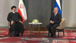 Russias Putin meets Iranian counterpart Raisi  AFP [upl. by Ydollem]