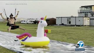 Skydiver lands directly on inflatable unicorn [upl. by Toddie23]