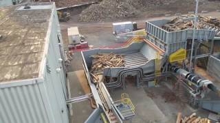 Rotary Debarker  24m Long Logs Being Discharged From 75m Long Side Discharge Debarker [upl. by Gilliette393]