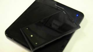 Panasonic Wireless Qi Charging Pad at CES 2013 [upl. by Reynold585]