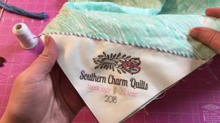 How to stitch on a corner quilt label [upl. by Bev]