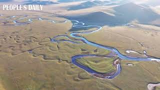 The Mergel Gol River meanders through the enchanting landscape of Hulun Buir Grassland in N China [upl. by Notrab]