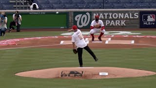 Fauci throws ceremonial first pitch on baseballs opening day  AFP [upl. by Sternlight662]