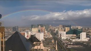 Rainbows and rain in the Las Vegas valley [upl. by Enidaj]