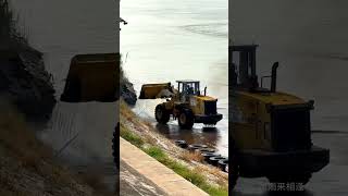 Loader cleaning the dock Ferry crossing the river Safety is the most important road Ferry cro [upl. by Oigaib949]