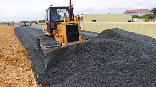 Bulldozer Spreading Gravel Building Foundation New Big Road And Dump Truck Unloading Gravel [upl. by Ylrebmik]