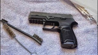 How to clean a Sig Sauer P320 Compact [upl. by Inar]