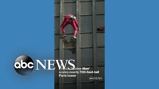 French SpiderMan scales 60story tower in Paris [upl. by Lindbom]