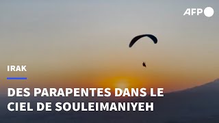 Irak une équipe de parapente survole la ville de Souleimaniyeh  AFP [upl. by Stranger]