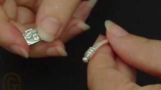 How to add charms to a Pandora Bracelet [upl. by Jaffe]