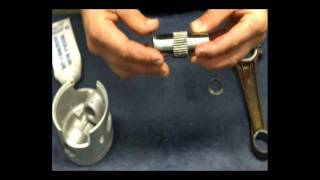 Outboard Rebuilding  How to install a piston onto a connecting rod [upl. by Fronniah]