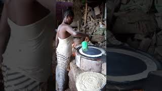 Making injera in Ethiopia on improved cookstove [upl. by Stambaugh]