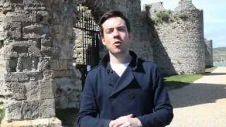 Portchester Castle An introduction to the history of Portchester Castle England [upl. by Lleruj]