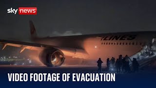 New footage of passengers evacuating burning plane in Japan [upl. by Aninep398]