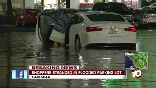 Drivers stranded as rain floods Carlsbad shopping center [upl. by Georgeanna236]