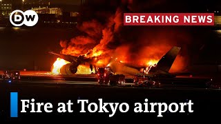 Japan Passenger plane bursts into flames on runway  DW News [upl. by Bary]