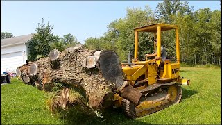 Unearthing a GIANT LOG with a 55 year old Traxcavator 4k [upl. by Nosduj359]