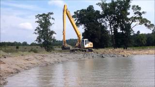 Liebherr 934 Long Reach Excavator Dredging Pond [upl. by Yelrahc]