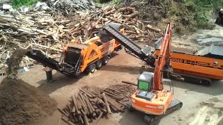 2012 08 24 10 36 17 doppstadt DW3060K and AK635 shredding railway sleeper [upl. by Byron]