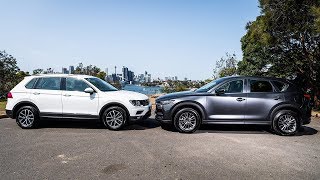 2019 Mazda CX5 vs 2019 Volkswagen Tiguan  Best Compact SUVs [upl. by Litman]