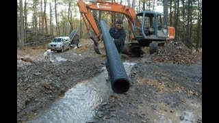 Installing culvert pipes [upl. by Ecinrev843]