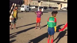 Ethiopia EthioAmerican Model Liya Kebede playing street soccer with Ethiopian teenage children [upl. by Erimahs]