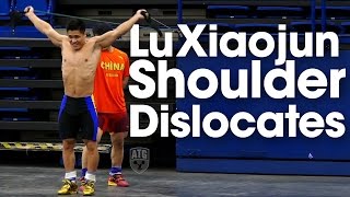 Lu Xiaojun amp Tian Tao Band Resisted Shoulder Dislocates 2015 World Weightlifting Championships [upl. by Hazrit984]